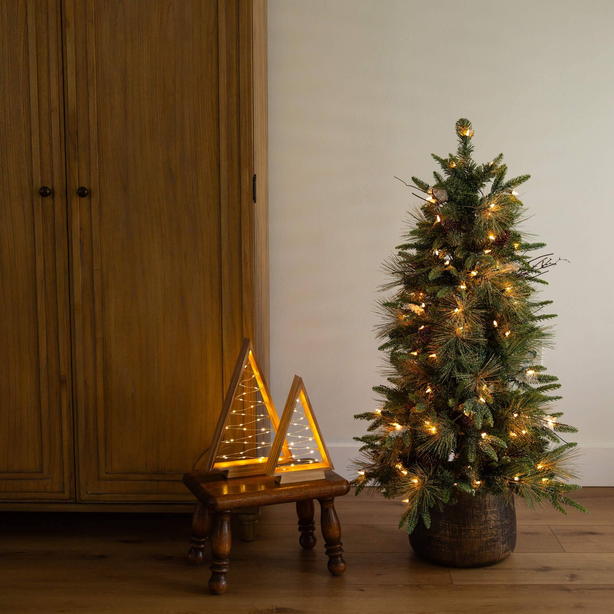 4ft. Pre-Lit Mixed Pine Snowed Artificial Christmas Tree with Pinecones in Decorative Planter, Warm White LED Lights